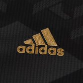 Adidas Logo on the Arsenal away jersey